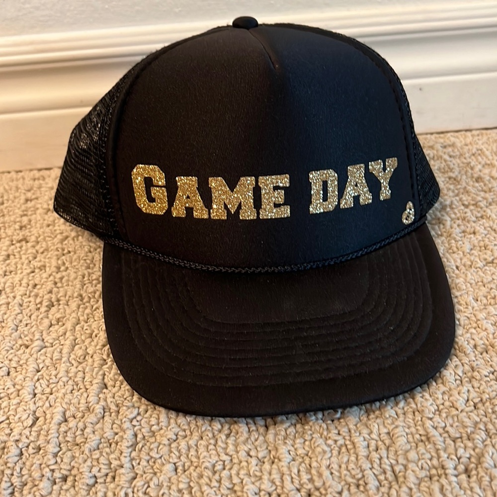 Black and gold mother trucker snapback hat